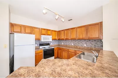 6169 Metrowest Boulevard #307, Orlando, FL 32835 - Photo 17