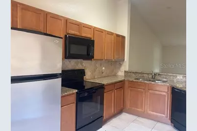 7807 Sugar Brook Court #7807, Orlando, FL 32819 - Photo 9