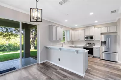 8386 Baywood Vista Drive, Orlando, FL 32810 - Photo 11