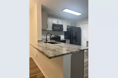 7606 Pissarro Drive #14102, Orlando, FL 32819 - Photo 5