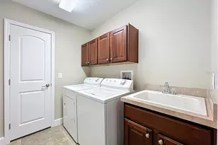 8640 Warwick Shore Xing, Orlando, FL 32829 - Photo 65