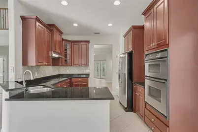 6976 Lucca Street, Orlando, FL 32819 - Photo 21