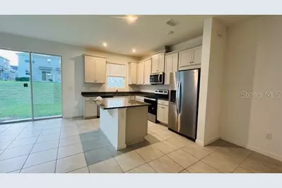 1128 Lakeshore Breeze Place, Kissimmee, FL 34747 - Photo 9