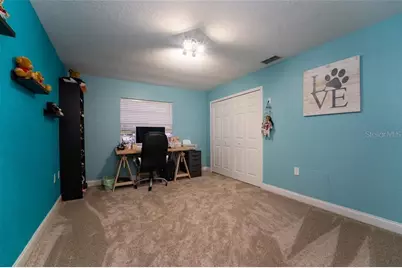 4627 Woodlot Court, Orlando, FL 32835 - Photo 11