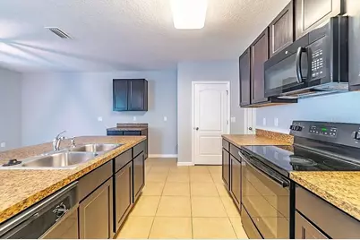 10201 Hawk Storm Avenue, Tampa, FL 33610 - Photo 13