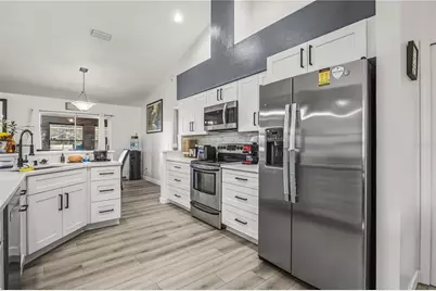 7736 Greytwig Lane, Orlando, FL 32818 - Photo 15