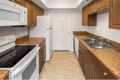 5838 Peregrine Avenue #E03, Orlando, FL 32819 - Photo 15