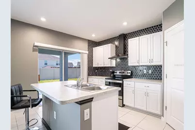 596 Meadow Bend Drive, Davenport, FL 33837 - Photo 17