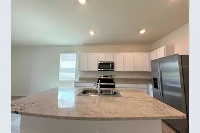 8769 Milestone Drive, Sarasota, FL 34238 - Photo 11