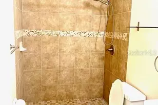 8214 Ambrose Cove Way, Orlando, FL 32819 - Photo 21