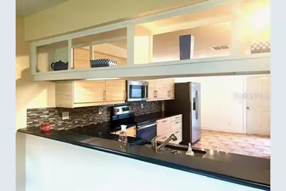 8214 Ambrose Cove Way, Orlando, FL 32819 - Photo 9