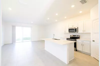 7609 Waterscape Drive, Groveland, FL 34736 - Photo 13