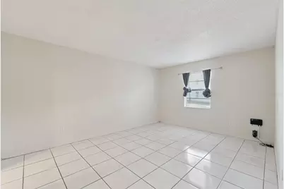 9122 Tudor Drive #M102, Tampa, FL 33615 - Photo 13