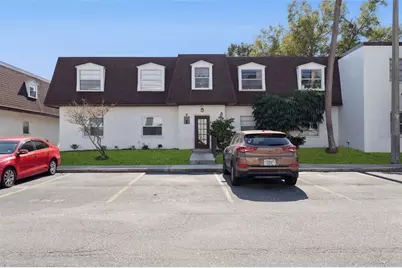 9122 Tudor Drive #M102, Tampa, FL 33615 - Photo 1