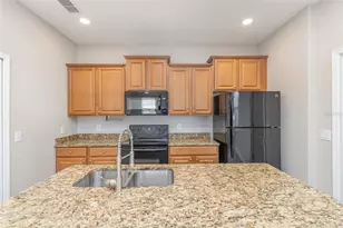 9029 Savannah Julip Ln, Orlando, FL 32832 - Photo 13