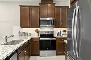 9972 Red Canoe Aly, Orlando, FL 32832 - Photo 13