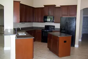 2748 Blowing Breeze Way, Orlando, FL 32820 - Photo 9