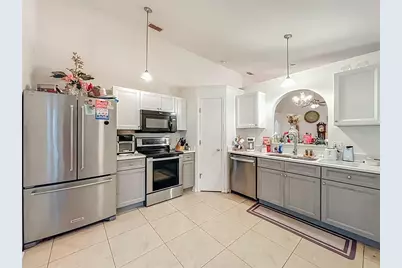 12905 Odyssey Lake Way, Orlando, FL 32826 - Photo 9