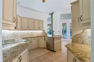 7725 Apple Tree Cir, Orlando, FL 32819 - Photo 11
