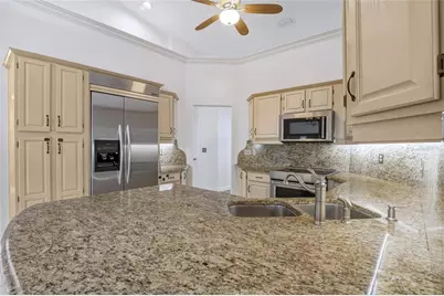 7725 Apple Tree Circle, Orlando, FL 32819 - Photo 13