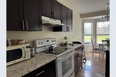 8000 Aspencrest Court, Orlando, FL 32835 - Photo 5