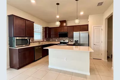 7488 Catania Loop, Clermont, FL 34714 - Photo 5