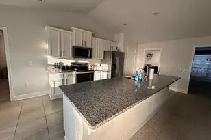 208 Lagoon Mist Ct, Oak Hill, FL 32759 - Photo 5