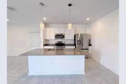 7280 Ivy Tendril Avenue, Orlando, FL 32829 - Photo 9