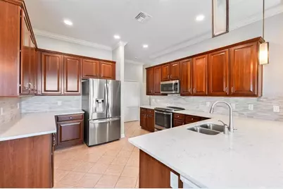 7704 Kings Passage Avenue, Orlando, FL 32835 - Photo 9