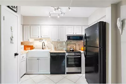 10365 Paradise Boulevard #21, Treasure Island, FL 33706 - Photo 13