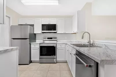 7606 Pissarro Drive #14305, Orlando, FL 32819 - Photo 9