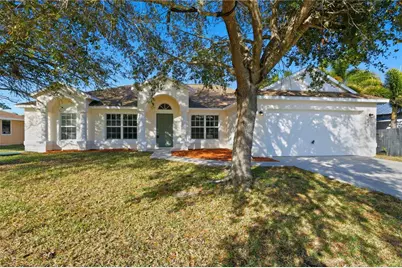 843 SE Carnival Avenue, Port Saint Lucie, FL 34983 - Photo 1