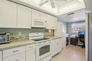 9461 Harbor Greens Way, Seminole, FL 33776 - Photo 11