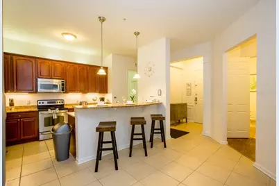 5049 Shoreway Loop #407, Orlando, FL 32819 - Photo 9