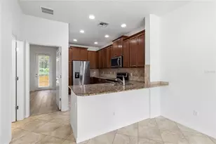 8681 Lower Villagewalk Cir, Orlando, FL 32827 - Photo 21