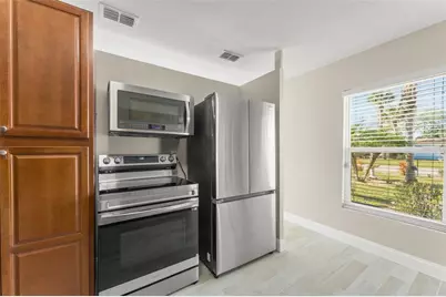 7727 Perugia Avenue, Orlando, FL 32819 - Photo 9