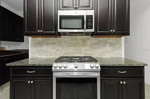 8235 Bird Whistle Ln, Land O Lakes, FL 34637 - Photo 7