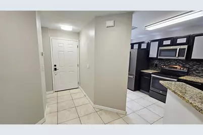 7805 Sugar Brook Court #7805, Orlando, FL 32819 - Photo 5