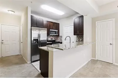 1101 Vintage Village Lane #104, Ocoee, FL 34761 - Photo 11