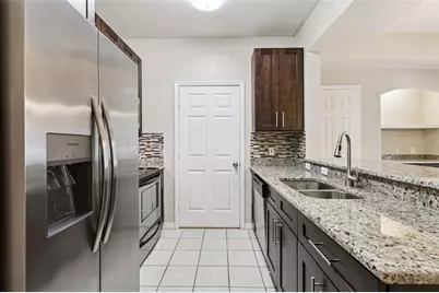 1101 Vintage Village Lane #104, Ocoee, FL 34761 - Photo 13