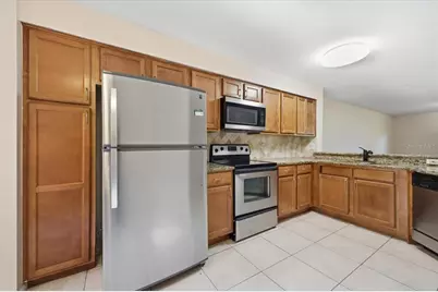 7764 Sugar Bend Drive #7764, Orlando, FL 32819 - Photo 9