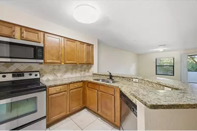 7764 Sugar Bend Drive #7764, Orlando, FL 32819 - Photo 7