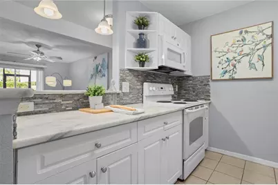 145 N Pearl Lake Causeway #106, Altamonte Springs, FL 32714 - Photo 15