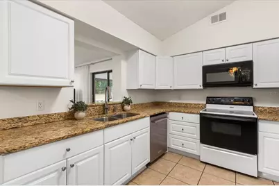 7736 Bay Cedar Drive, Orlando, FL 32835 - Photo 13