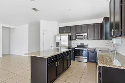 12327 Sawgrass Prairie Loop, Orlando, FL 32824 - Photo 9