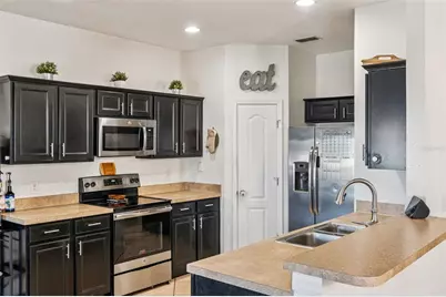 3933 Pemberly Pines Circle, Saint Cloud, FL 34769 - Photo 13