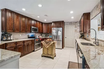 6054 Marlberry Drive, Orlando, FL 32819 - Photo 25