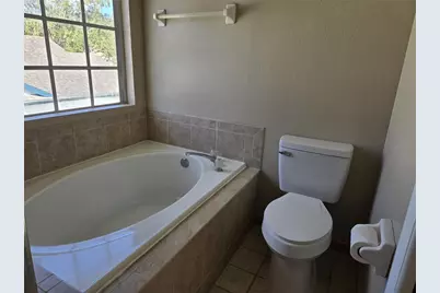 10704 Satinwood Circle, Orlando, FL 32825 - Photo 23