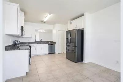 7806 Tanbier Drive, Orlando, FL 32818 - Photo 7