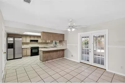 9714 Poplarwood Court, Orlando, FL 32825 - Photo 7